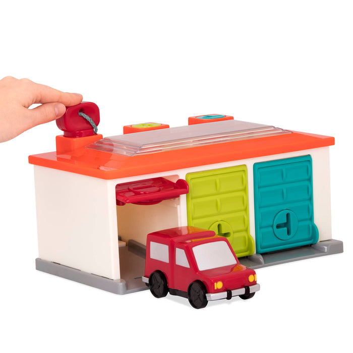 Toy garage and toy cars.