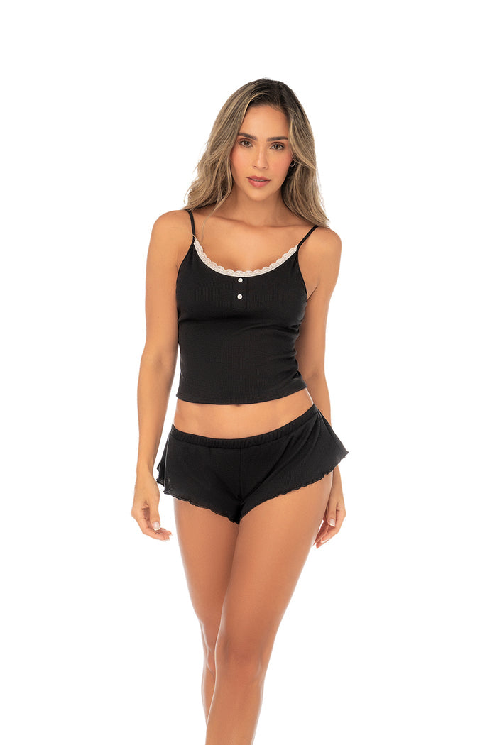 Two-piece pajama set featuring contrast trim cami top and matching flutter shorts.