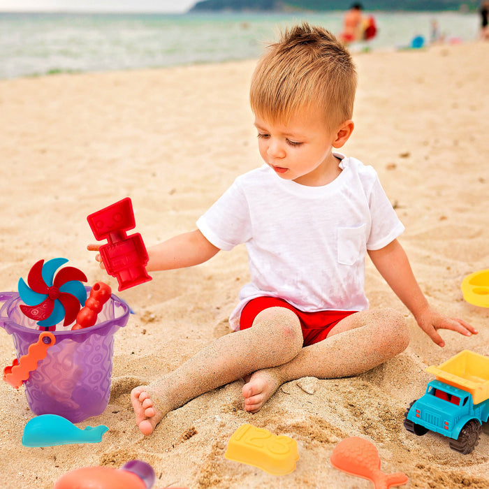 Beach toys with purple bucket.