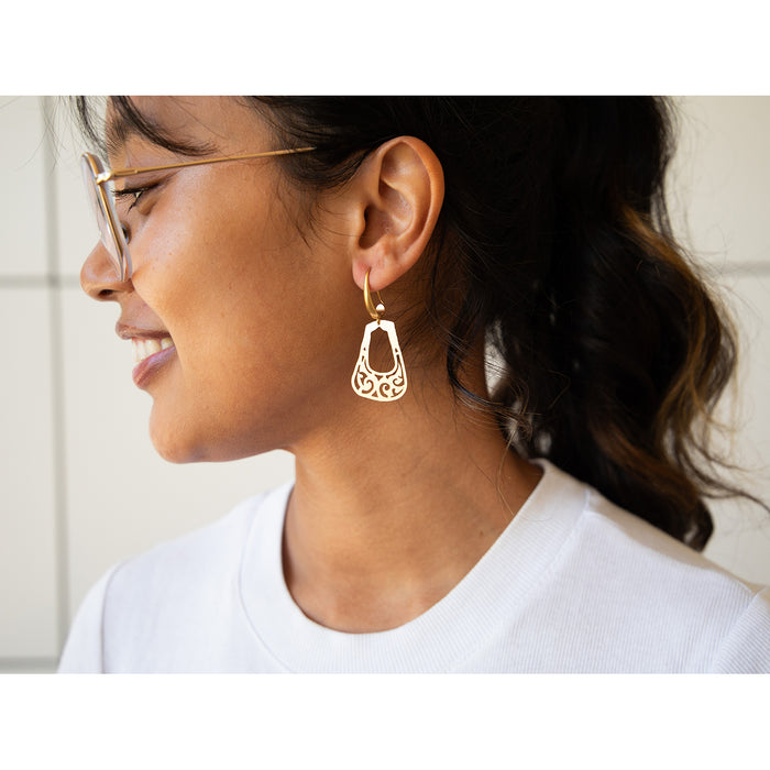 Model wearing Bactrian Ornament Small Hook Earrings