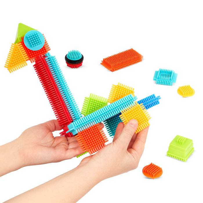 Colorful building blocks laid out, so you can see all the pieces.