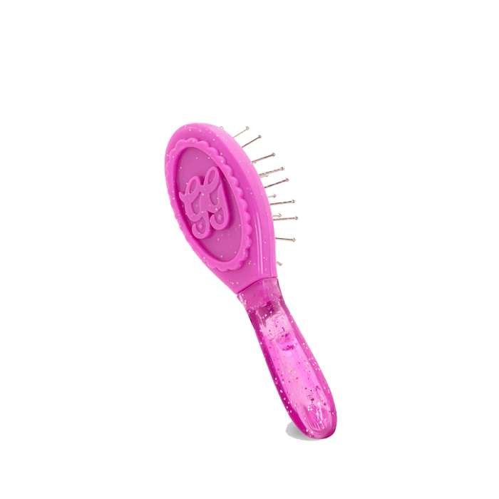 Toy hair brush and spray bottle for dolls