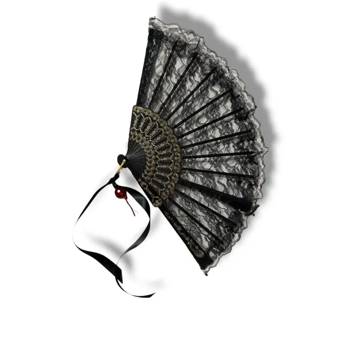 Black Lace Vintage Handheld Fan with black ribbon and red beaded tassel flat lay