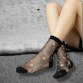 Black Pink Floral Mesh Frilly Ankle Socks with black cotton footbed, ruffled cuff, sheer mesh upper and pink floral detail