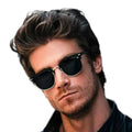 Black polarized semi rimless sunglasses with silver metal accents and adjustable nose pads – sleek unisex shades for festivals, driving, and outdoor wear