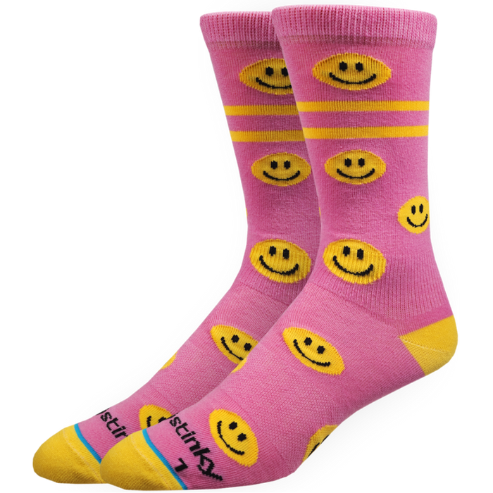Pink socks with yellow smiley faces on a white background