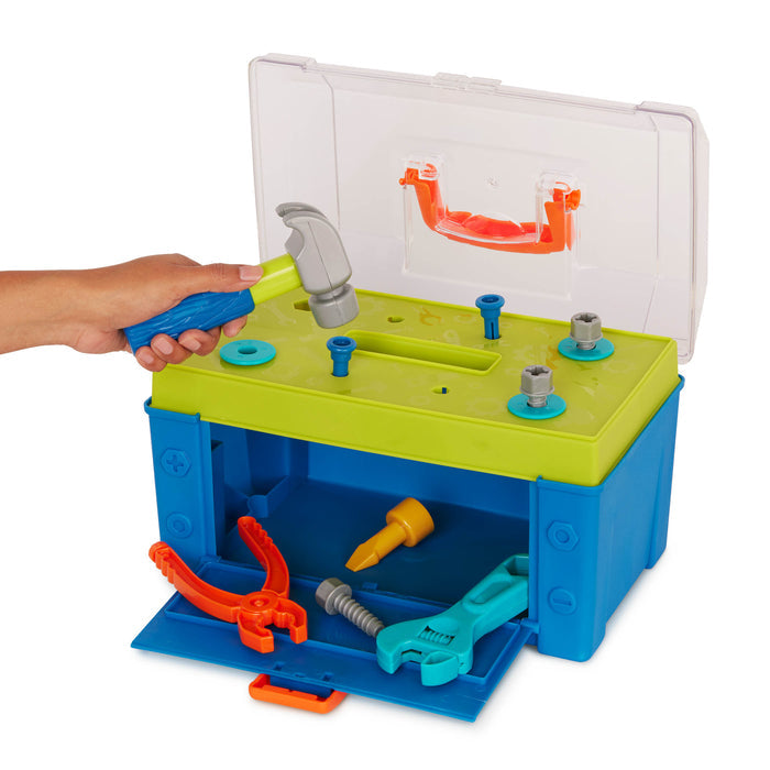 A blue and green toy tool box surrounded by toy tools.