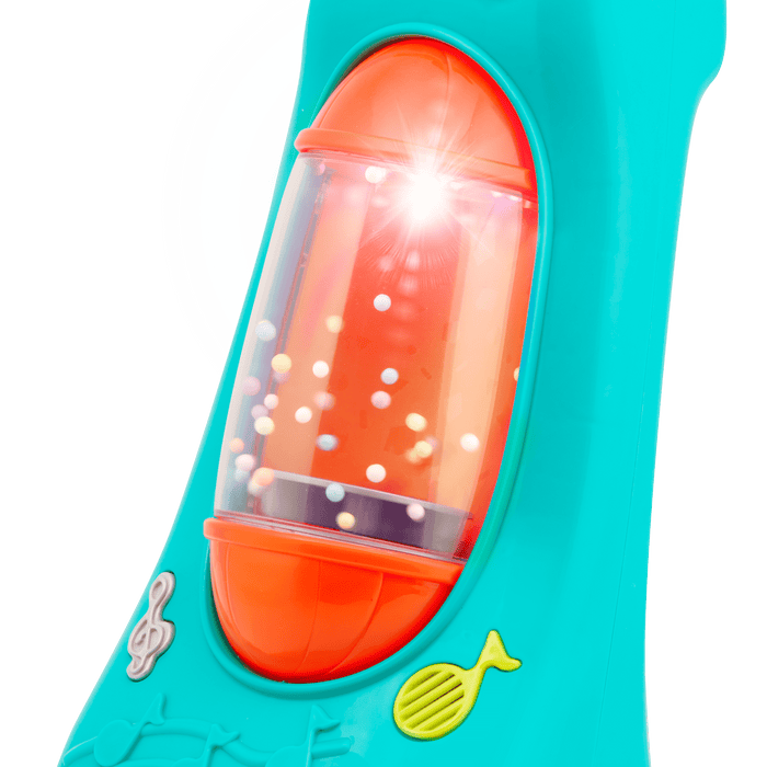 Colorful toy vacuum with music note graphics.