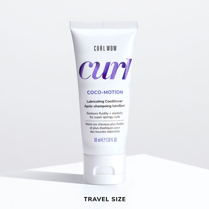 Color Wow Curl Wow Coco-Motion Conditioner Travel Size 60ml tube on a white background, nourishing conditioner that restores moisture, improves elasticity, detangles curls, and enhances softness, bounce, and definition.