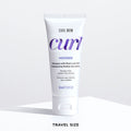 Color Wow Curl Wow Hooked Shampoo Travel Size 60ml tube on a white background, sulfate-free shampoo with Root-Lock Tech that gently cleanses curly hair, removes residue without stripping moisture, and helps maintain healthy, defined curls.