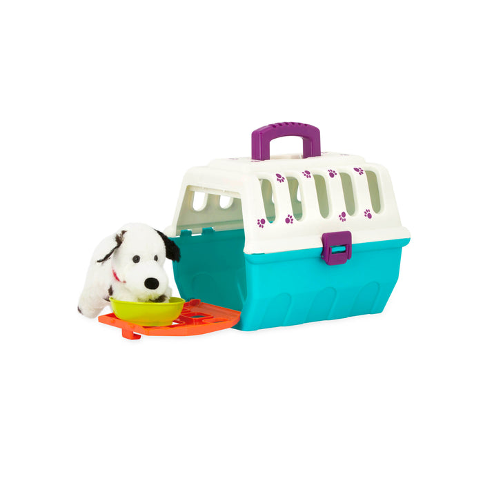 A toy vet kid for kids with a plush puppy in a carrier.