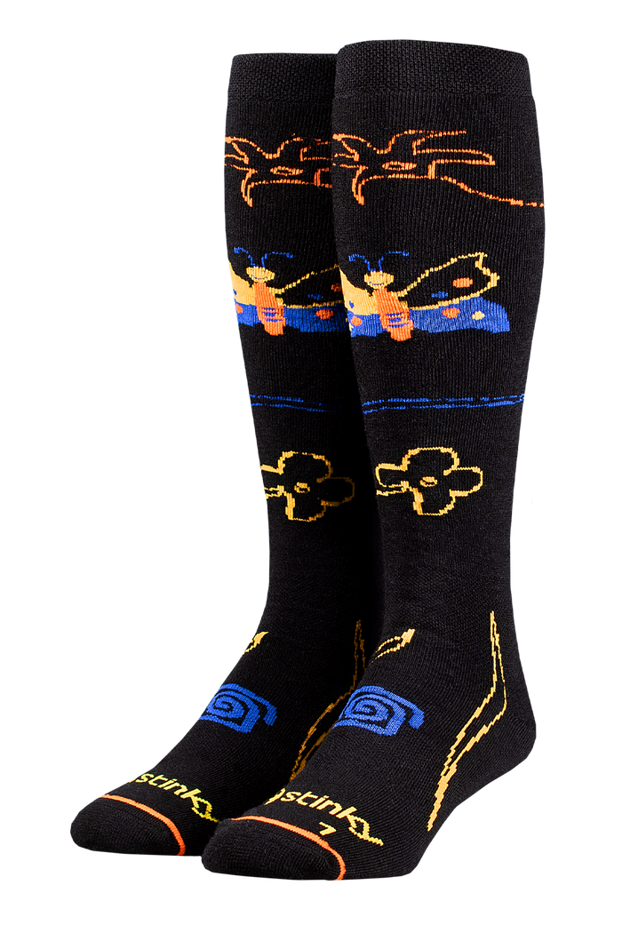 Black socks with colorful designs on a white background
