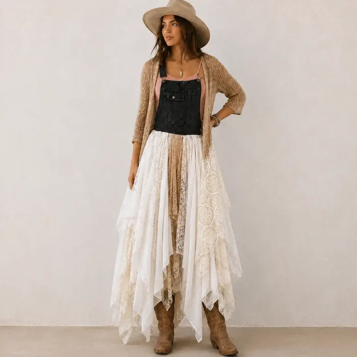 woman wearing Denim & Lace Asymmetric Midi Dress with black overall bodice, adjustable straps, white lace with long duster