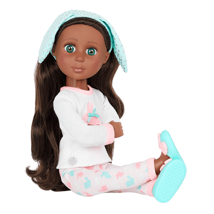 14-inch posable doll with brown hair and green eyes