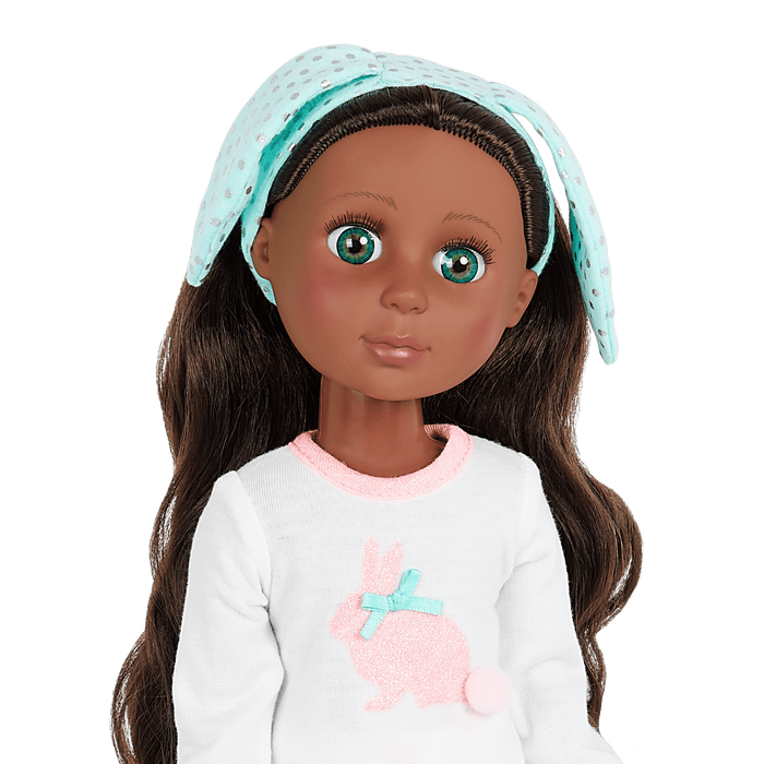 14-inch posable doll with brown hair and green eyes