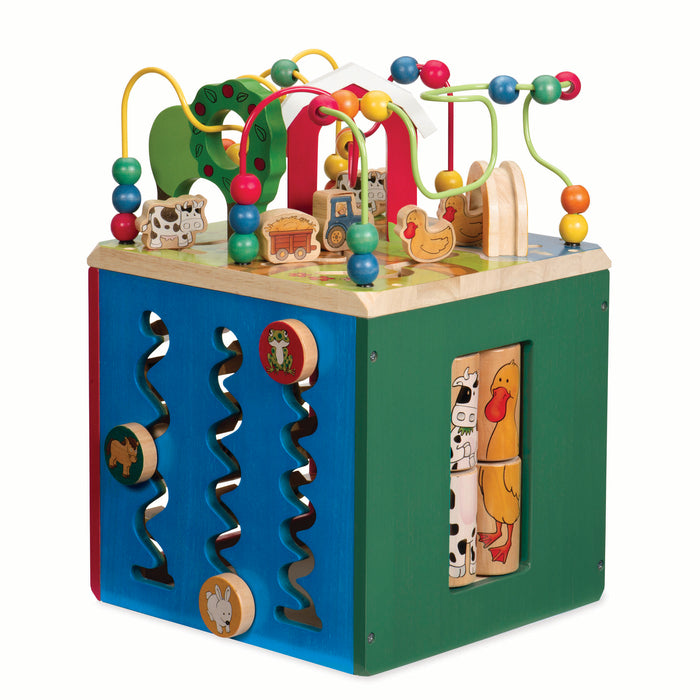 Farm animal activity center with a bead maze on top.