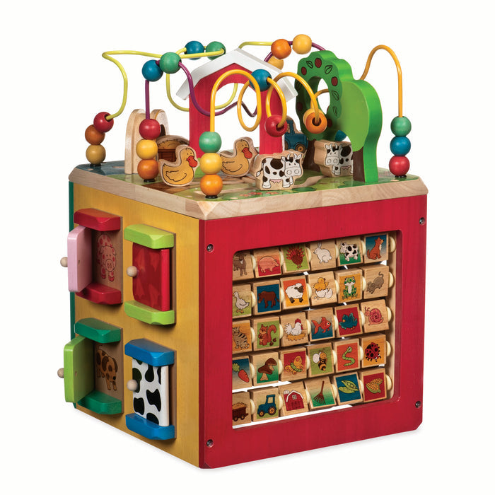 Farm animal activity center with a bead maze on top.