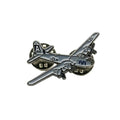 A silver-toned metal lapel pin shaped like a B29 Superfortress named FIFI