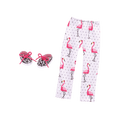 Flamingo-printed leggings and black & white patterned shoes