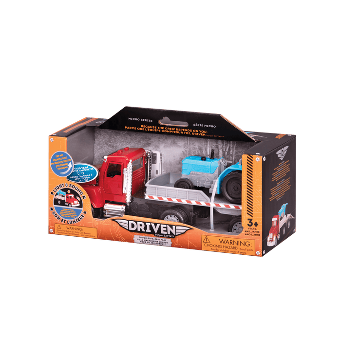 Red toy flatbed truck carrying blue tractor