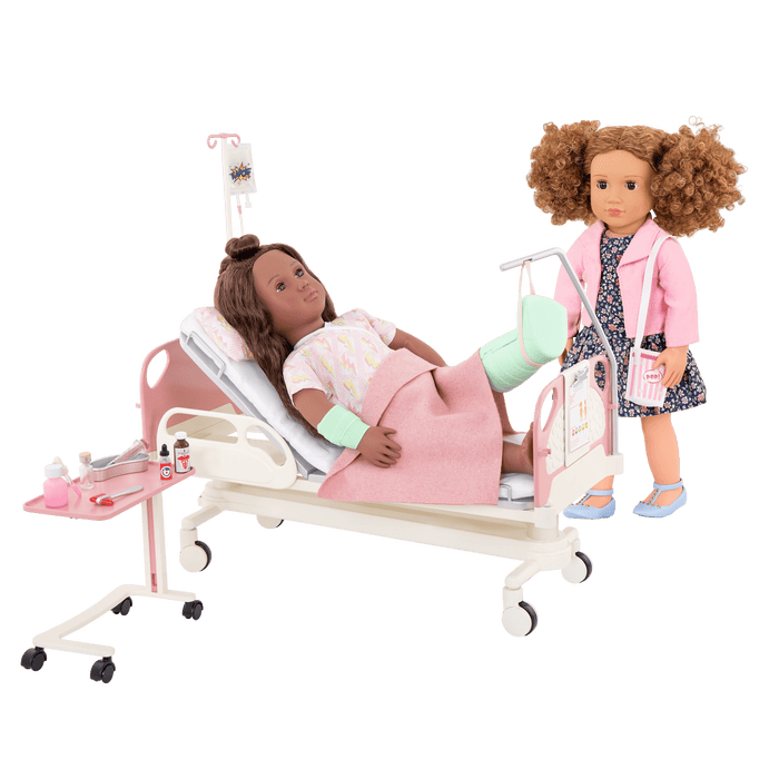 Two 18-inch dolls with hospital gurney playset