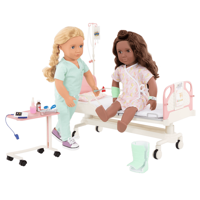Two 18-inch dolls with hospital gurney playset