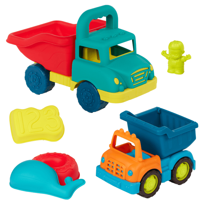 Toy dump trucks with sand molds