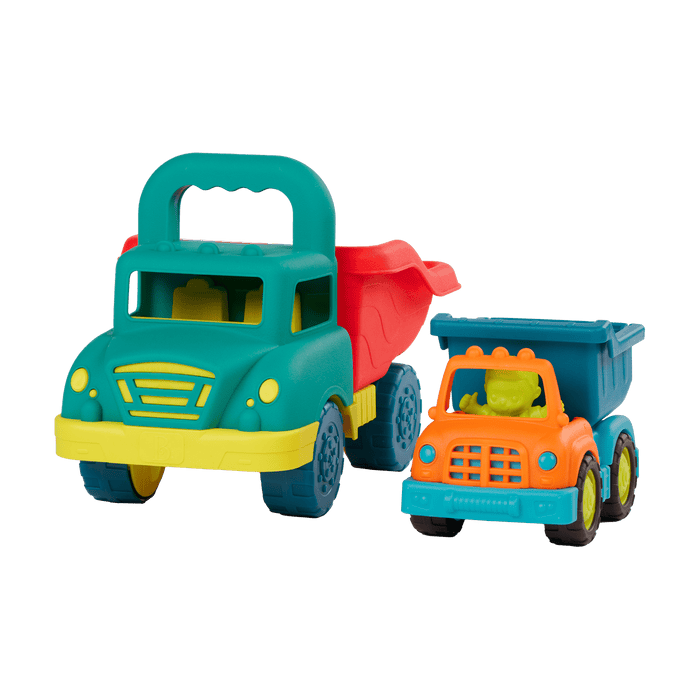 Toy dump trucks with sand molds