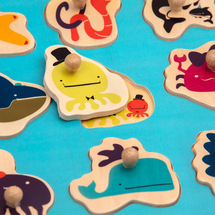 Ocean-themed wooden peg puzzle