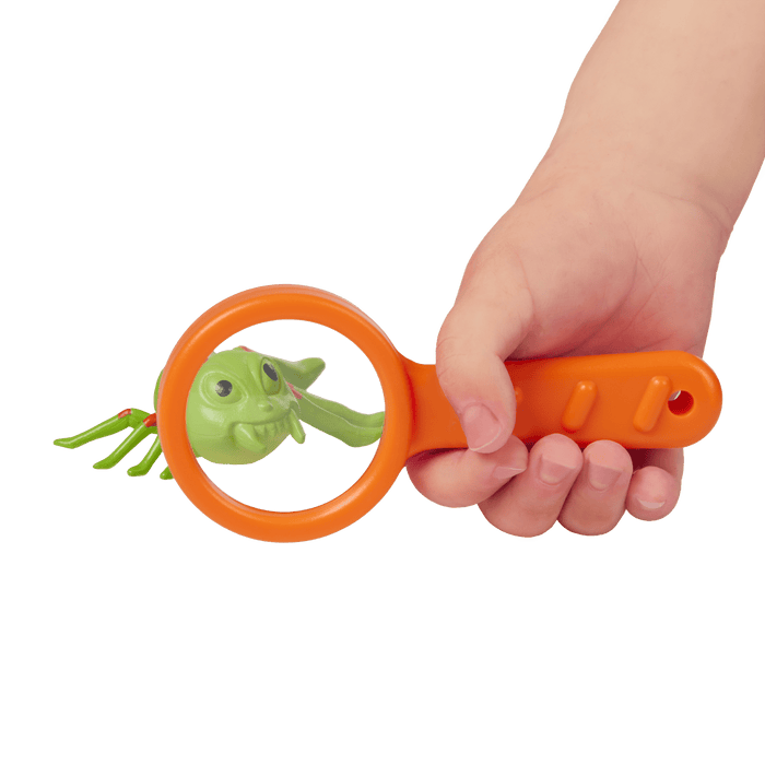Bug catcher vacuum with magnifying glass, tweezers, toys, and capture jar