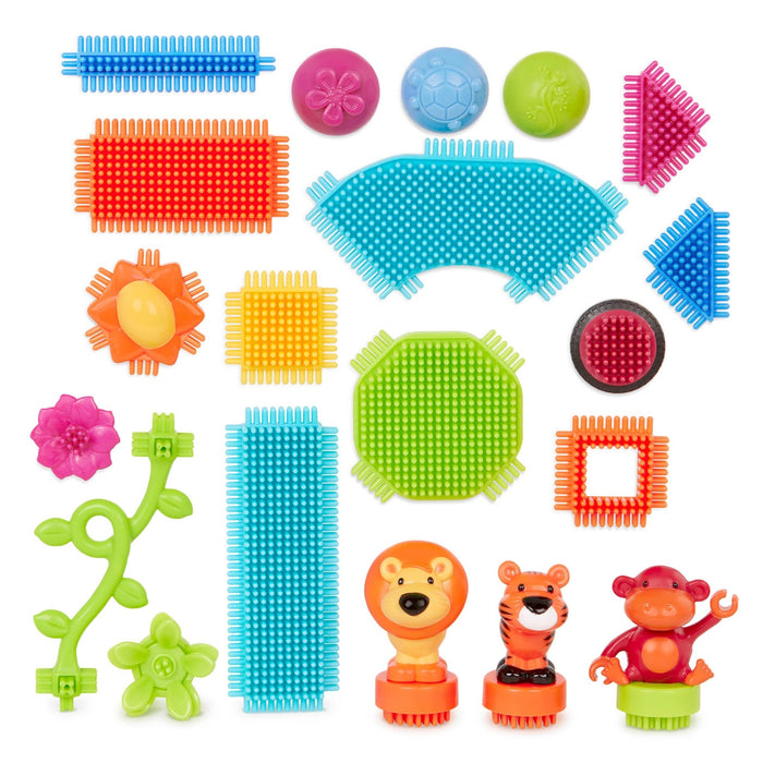 Creations made with Bristle Blocks, including a car with functional wheels.