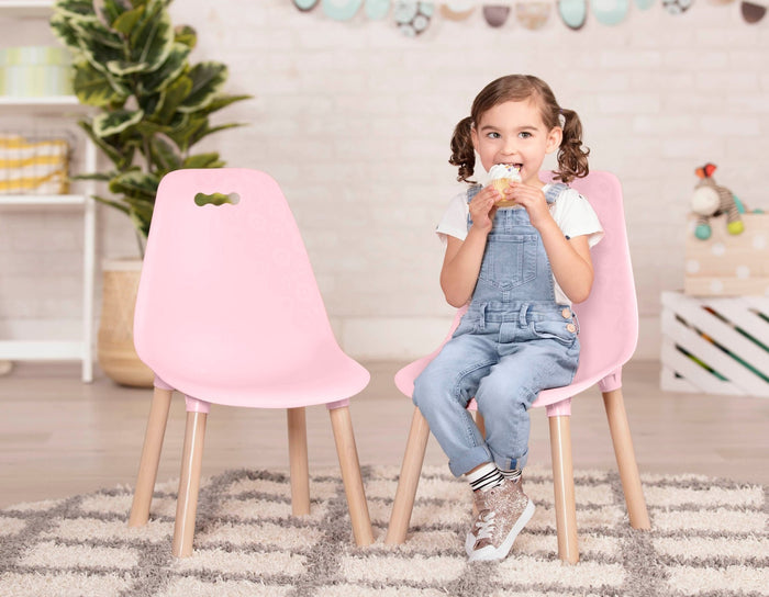 Two pink chairs for kids.