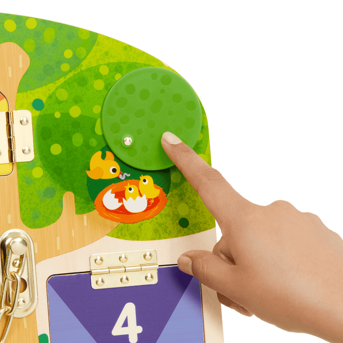 Booklet and board with animal illustrations and doors with locks and latches.