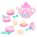 A toy tea set with toy cupcakes.