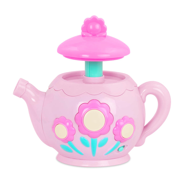 A toy tea set with toy cupcakes.