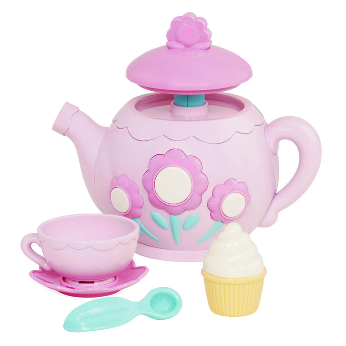 A toy tea set with toy cupcakes.