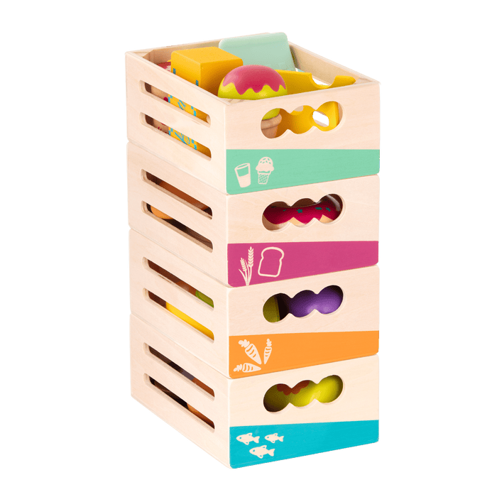 Wooden play food in crates.