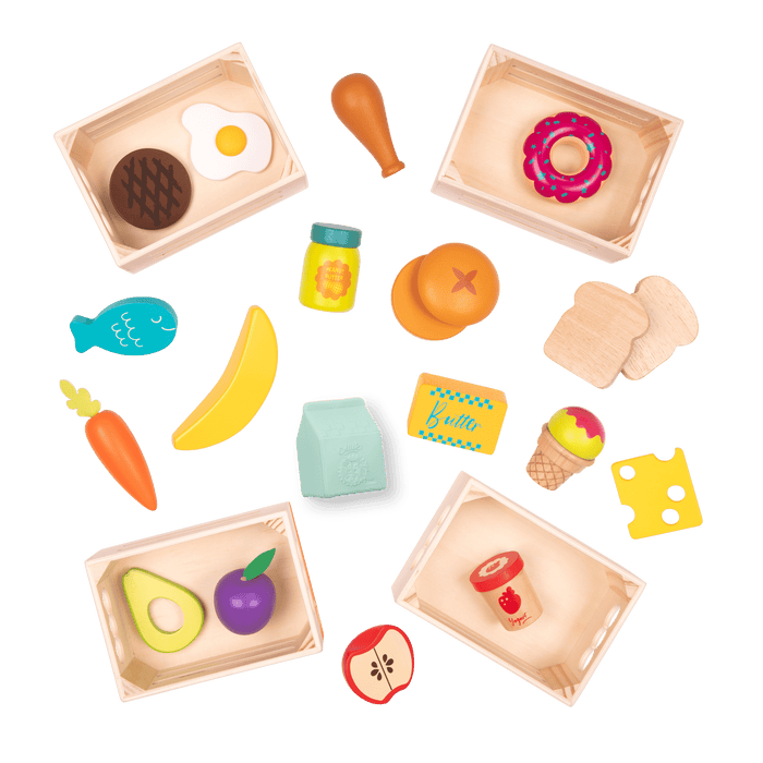 Wooden play food in crates.
