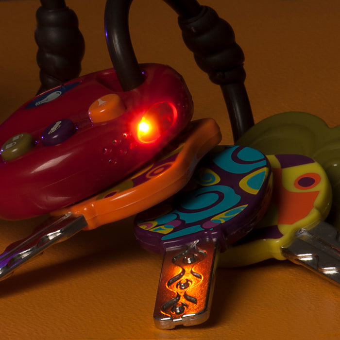 Red toy car keys.