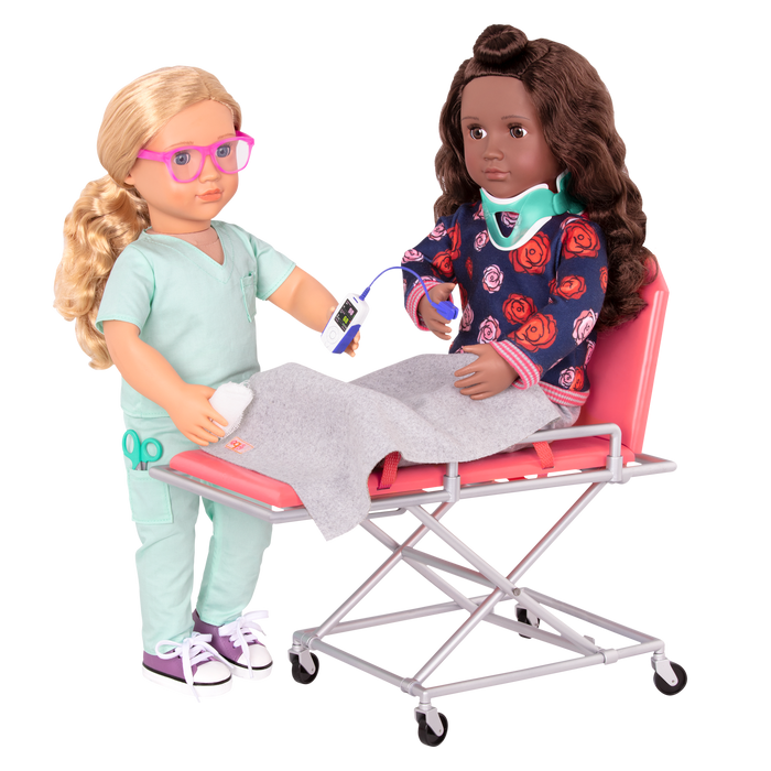 Two 18-inch dolls using ambulance gurney