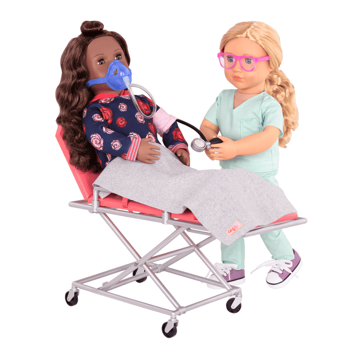 Two 18-inch dolls using ambulance gurney