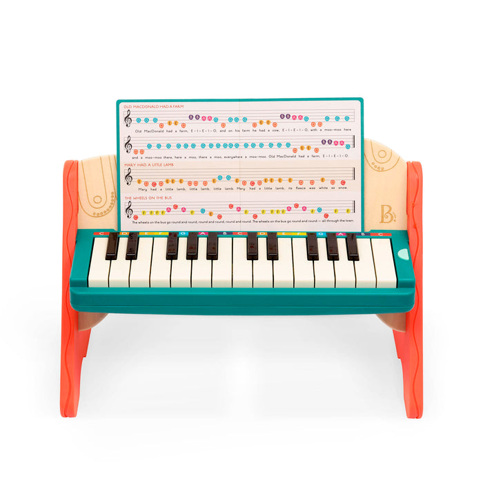 Wooden toy piano with songbook.