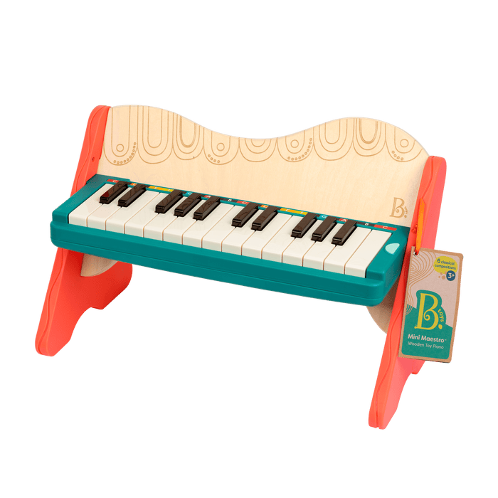 Wooden toy piano with songbook.