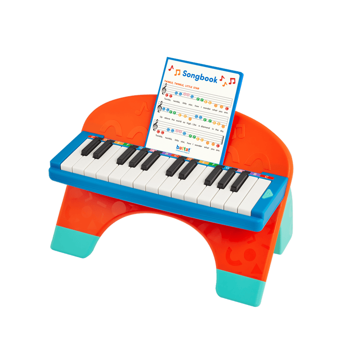 Toy piano and songsheet