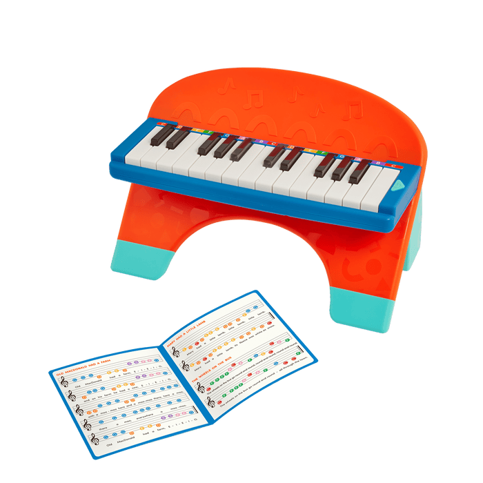 Toy piano and songsheet