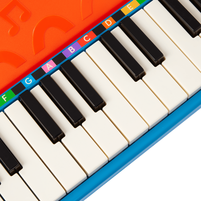 Toy piano and songsheet