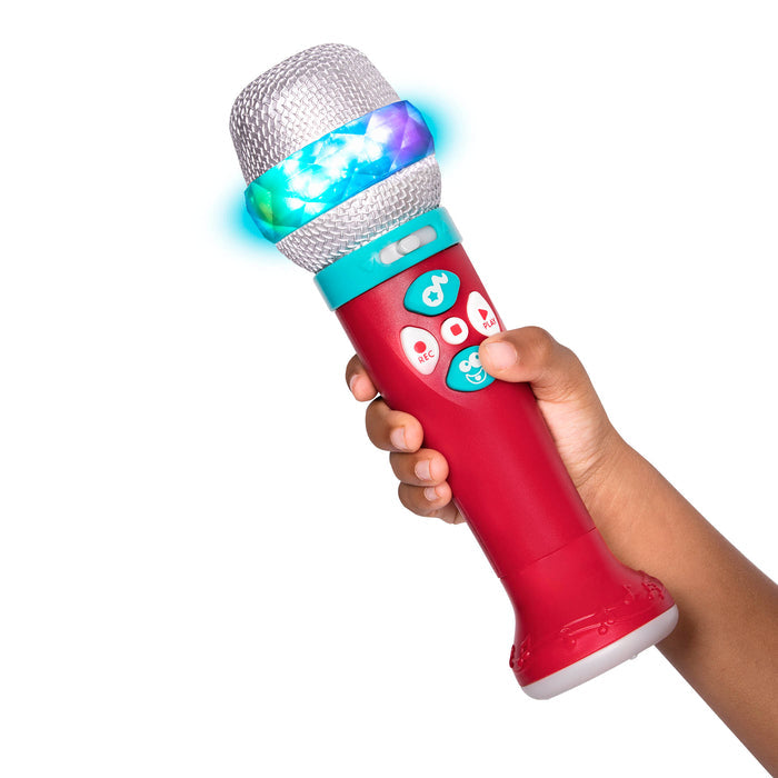 A red microphone toy for toddlers and kids.IA child playing with a toy microphone.