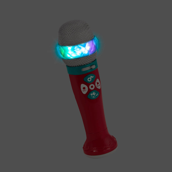 A red microphone toy for toddlers and kids.IA child playing with a toy microphone.