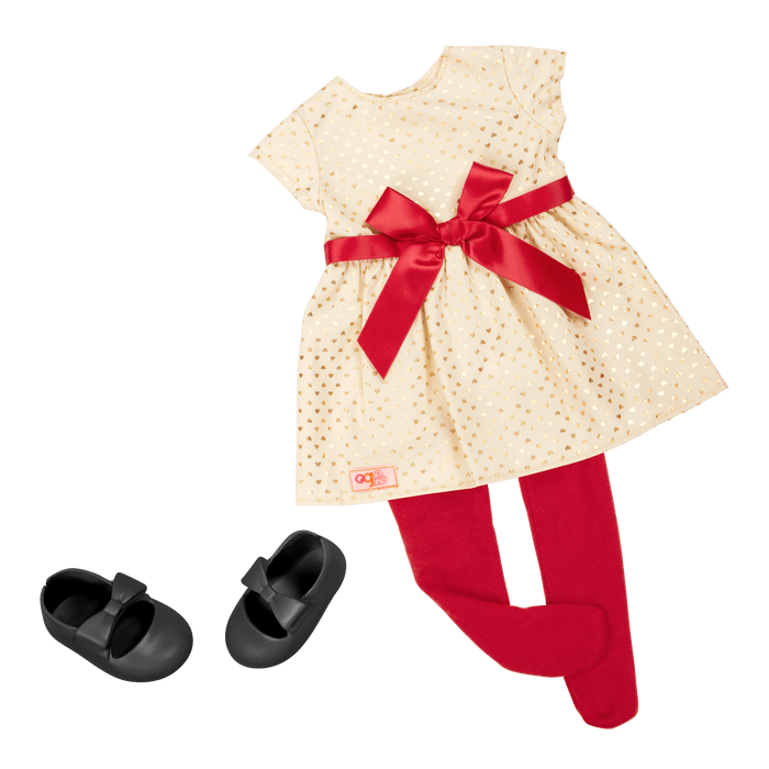 18-inch holiday doll with blonde hair, brown eyes, Christmas accessories and storybook
