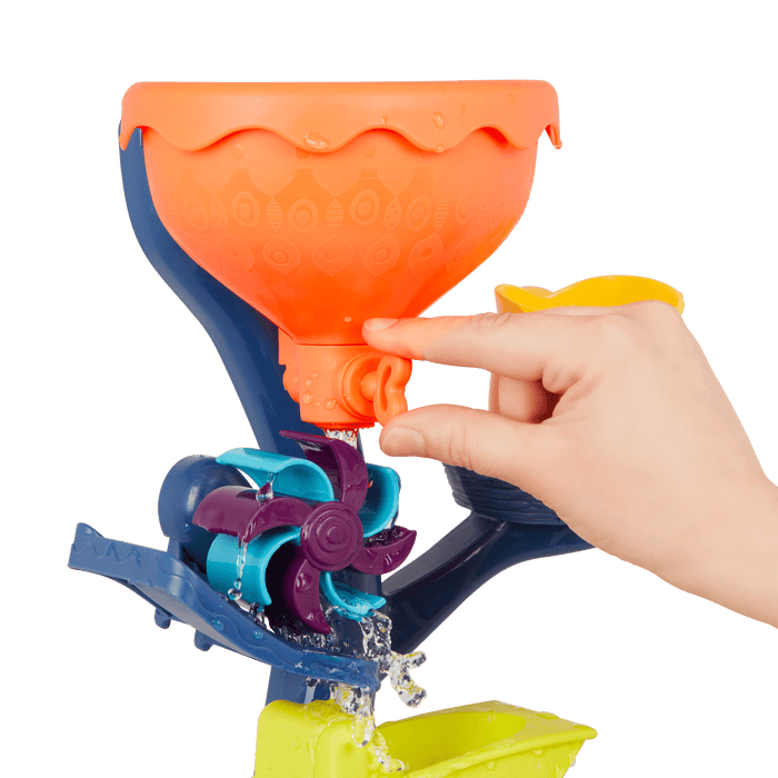 Water wheel toy with owl and truck.